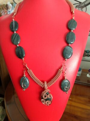 Necklace and earrings Necklace and earrings with gold wirework. Puffy green and blue agate. Can be made with or without wire gizmo work or with wirework and pendant. Price on application.