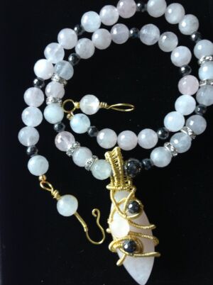 Rose Quartz beads & pendant Rose Quartz beads & pendant with hematite beads. Handmade wirework and crystal beads. Please specify what length you would like when ordering and we will send you a quote.