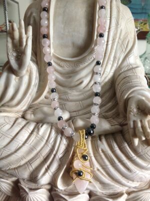 Rose Quartz beads & pendant Rose Quartz beads & pendant with hematite beads. Handmade wirework and crystal beads. Please specify what length you would like when ordering and we will send you a quote.