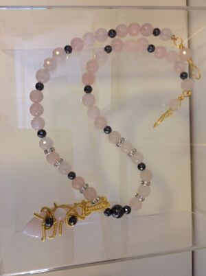 Rose Quartz beads & pendant Rose Quartz beads & pendant with hematite beads. Handmade wirework and crystal beads. Please specify what length you would like when ordering and we will send you a quote.