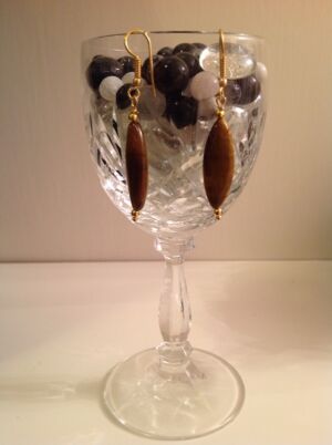 Simple earrings (set) Simple earrings (set) made with tigers eye ovals. Can be made to order subject to availability of the gemstone.£25 for the set.