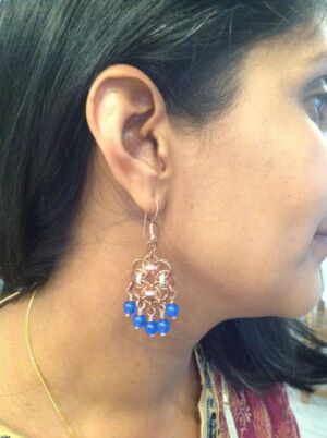 Chandelier earrings in rose gold My friend Celma wearing small chandelier earrings in rose gold.