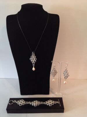 This is the Venice reminiscent of the elegant ladies of the Doge's Court. This is the Venice reminiscent of the elegant ladies of the Doge's Court. An intricate Chainmaille design that incorporates shell pearls.