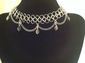 This is part of the Austen set This is part of the Austen set- an elegant Chainmaille design using the European 4 in 1 weave, additional silver chain and abalone shell drops.