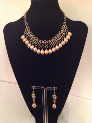 This is the Victoria This is the Victoria- an elegant use of Chainmaille combined with shell pearl drops.