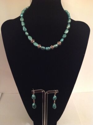 This is the Lakme series using freshwater pearls. This is the Lakme series using freshwater pearls. These are beautiful teal coloured pearls with silver accents and would be a lovely addition to your LBD for any formal or informal occasion.